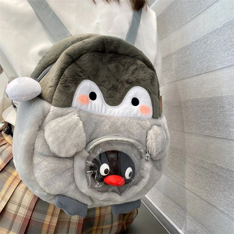 grey fluffy mini backpack Totoro Plush Adjustable shoulder straps and a haul loop give you flexibility in how you wear it Penguin Plush Mini Backpack |