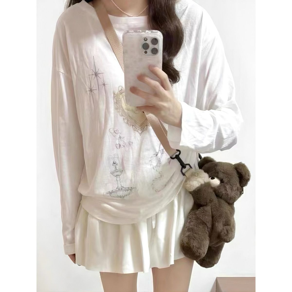 ハートを抱いたクマさんのくたふわポーチ