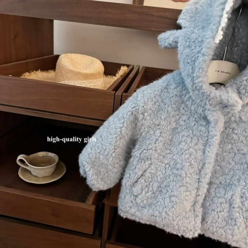 A children's boa coat with an eye-catching shark design 